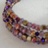 Purple toned multi-bead wrap bracelet